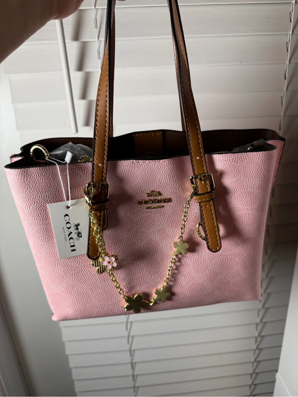 Coach Pink Pebbled Leather Tote with Tan Straps and Gold Charm